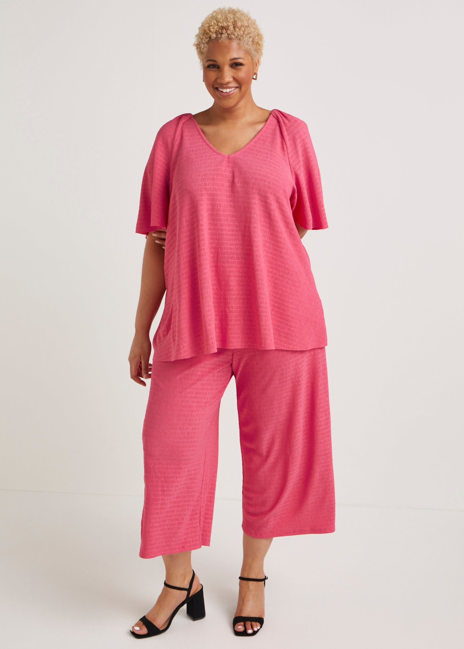 Buy Papaya Curve Plisse Cropped Trousers Online in UAE from Matalan